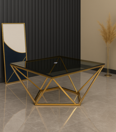 : Glass coffee table with geometric metal frame and polished top